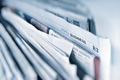 Close up of stacked newspapers